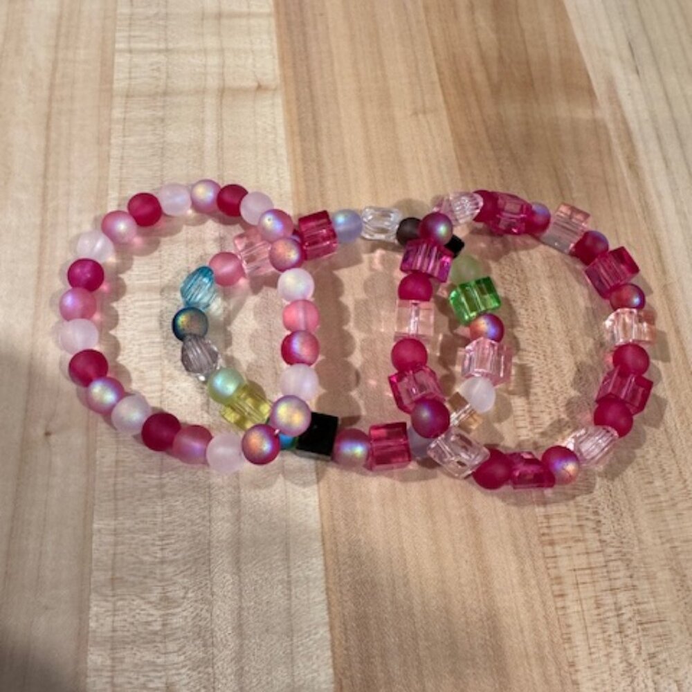 Set of three handmade bracelets pink and multicolored